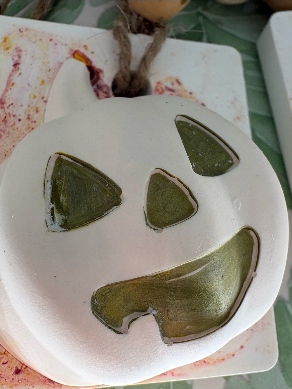 White pumpkin aroma stone with Olive Green Inset Details